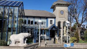 Exterior of The Goat Bar & Grill in Goatstown, a landmark pub with traditional charm, outdoor seating, and a welcoming atmosphere in South Dublin