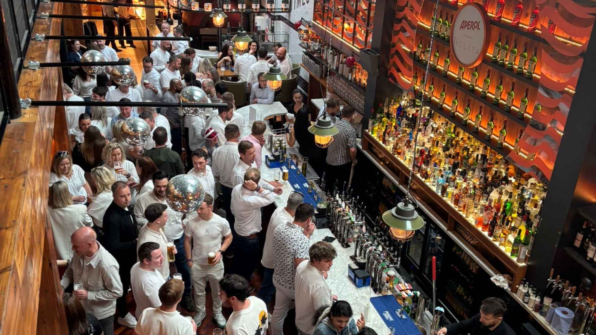 Guests networking and socialising during Citco's corporate summer party at Nolita in Dublin city centre.