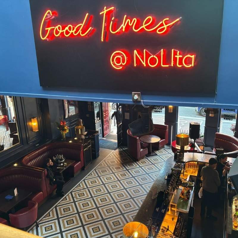 Good Times at Nolita sign overlooking the main event space before Citco's corporate summer party in Dublin.