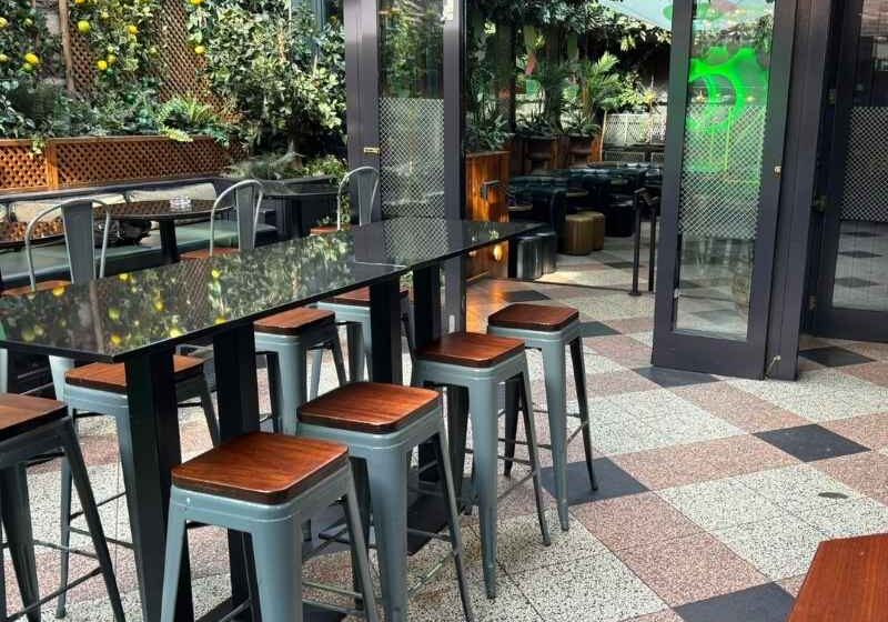 Outdoor terrace at Nolita providing guests with a relaxed space during Citco's corporate summer party.